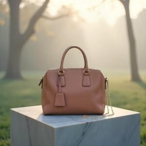 Sleek Minimalist Leather Handbag in Neutral Tone with Elegant Gold Jewelry Accent