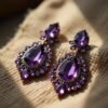 Colorful Large Statement Earrings: Close-Up Textured Shine on White Fabric